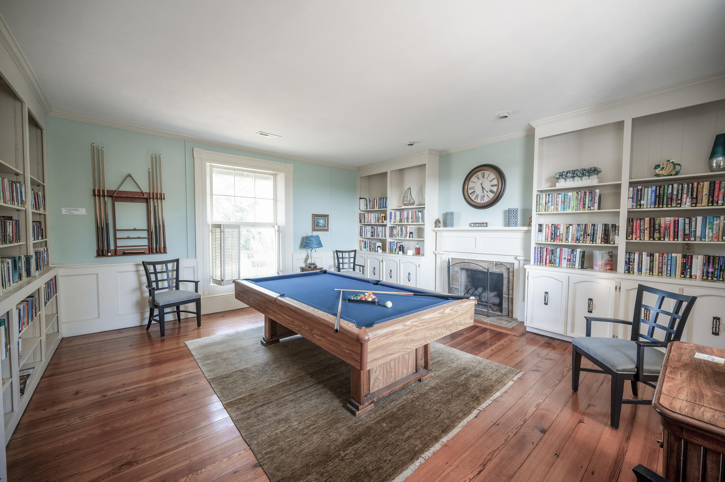 150 Sailor's Cove Drive, Unit 1218 Moneta, VA 24121 - Photo 40 of 56 a living room with furniture a table and a fireplace