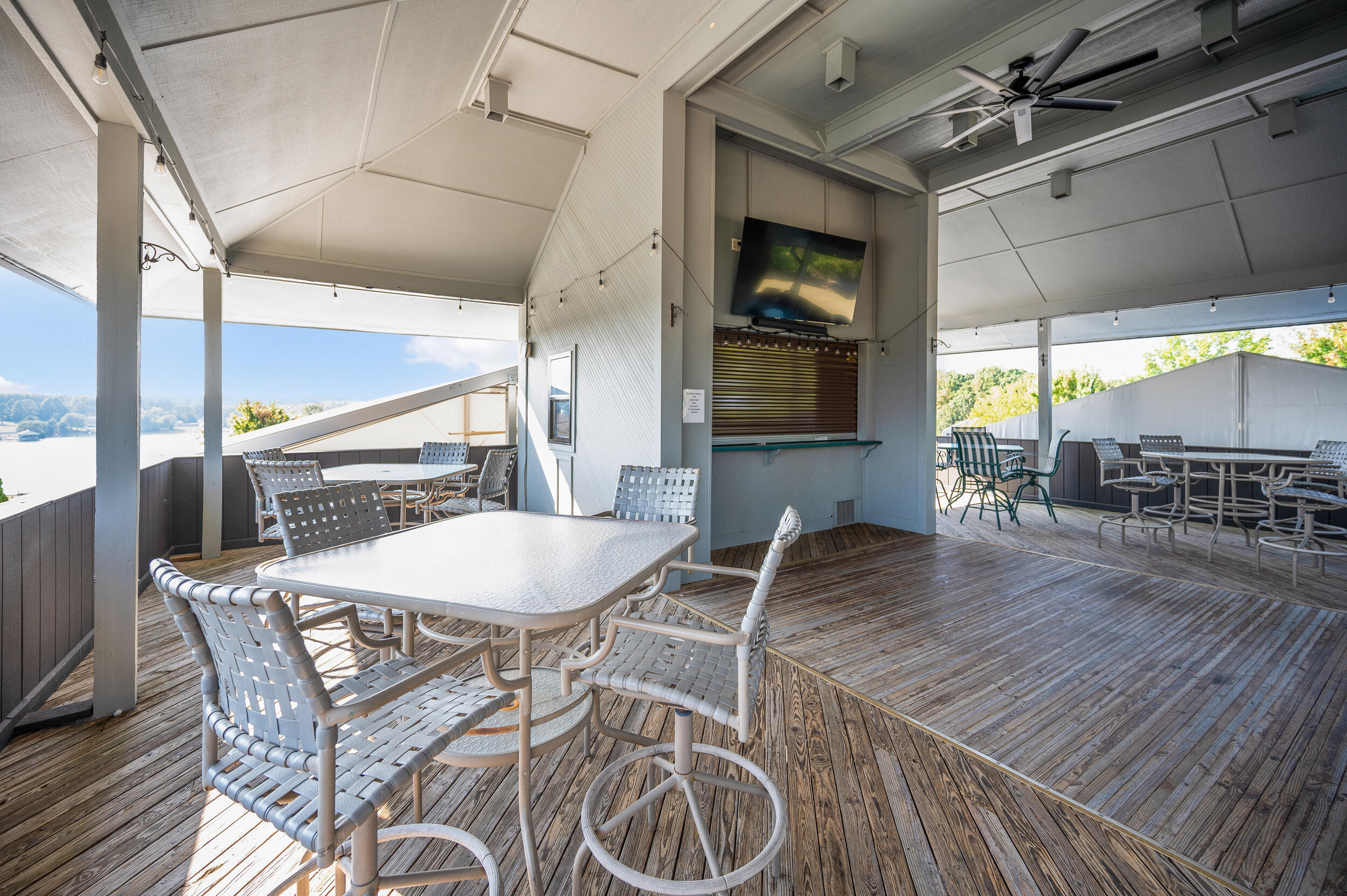 150 Sailor's Cove Drive, Unit 1218 Moneta, VA 24121 - Photo 42 of 56 a view of a dining room with furniture window and wooden floor