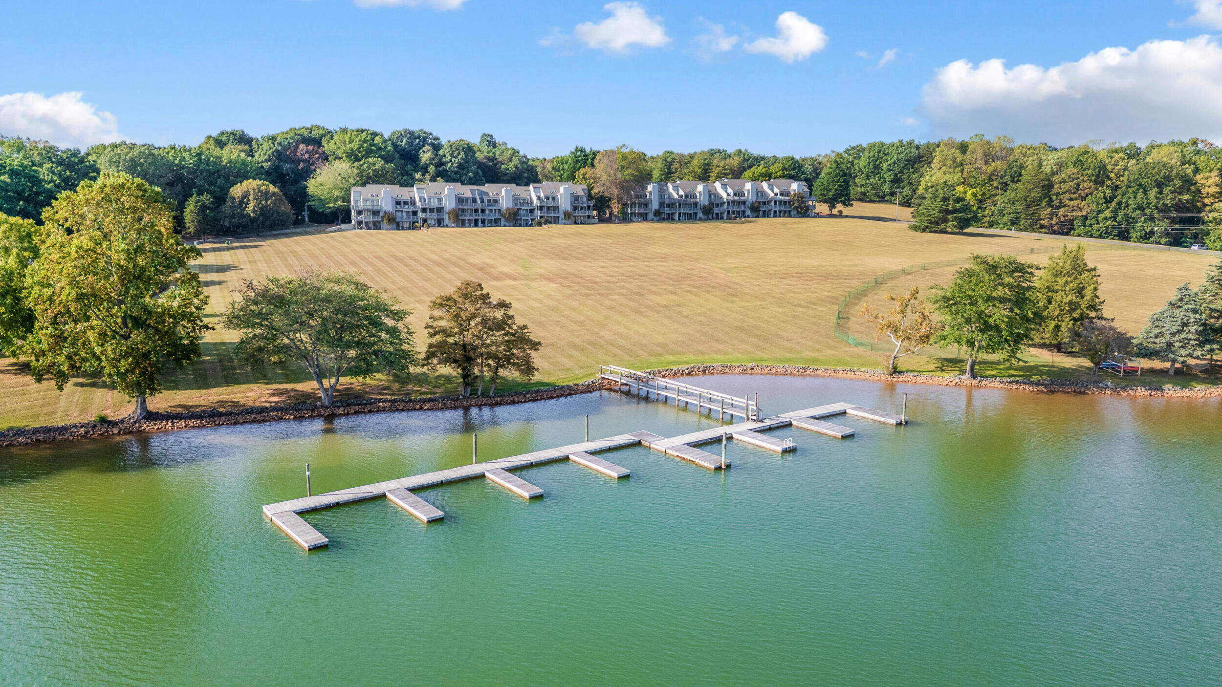 150 Sailor's Cove Drive, Unit 1218 Moneta, VA 24121 - Photo 51 of 56 an aerial view of a house with a lake view