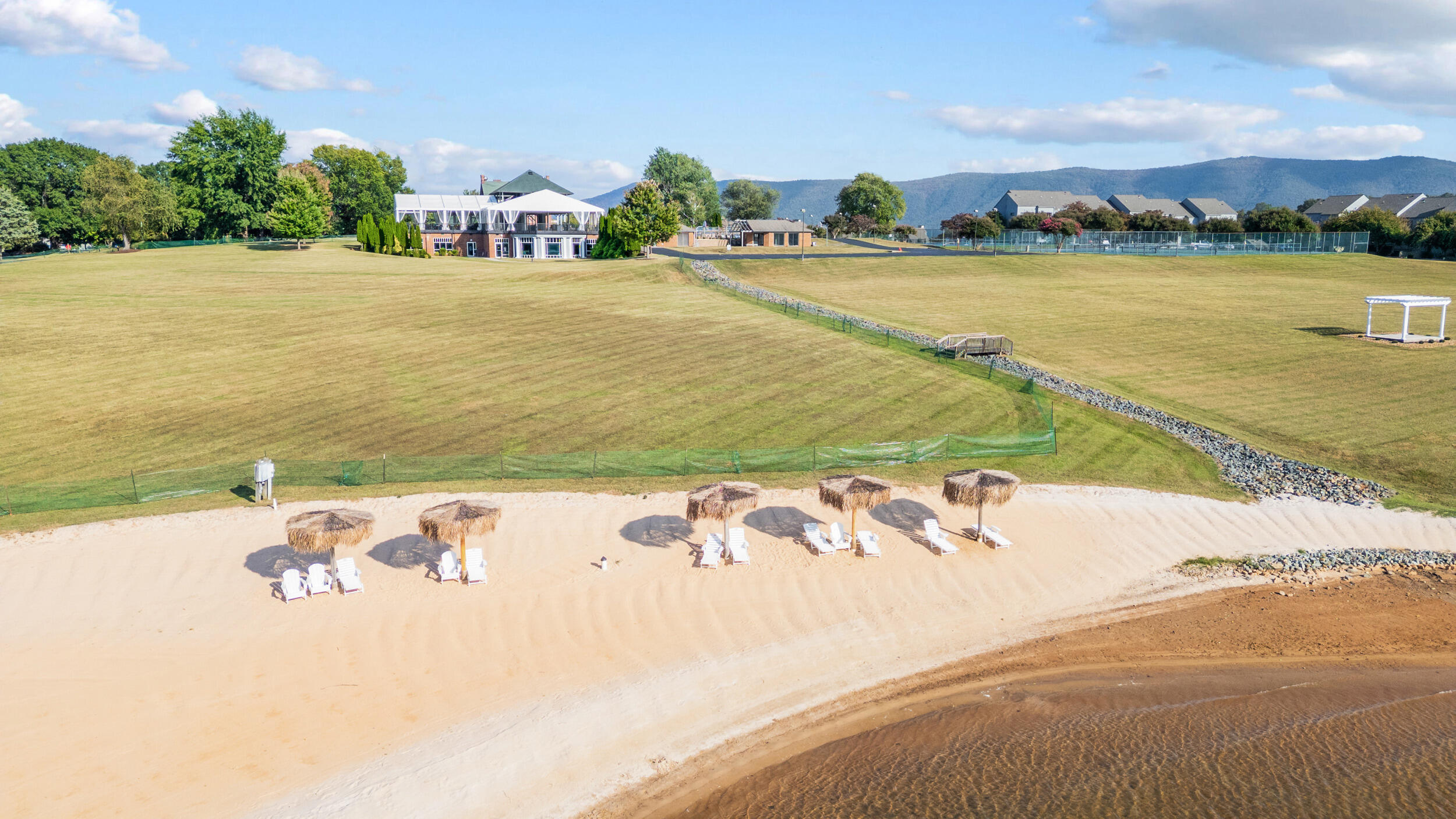 150 Sailor's Cove Drive, Unit 1218 Moneta, VA 24121 - Photo 52 of 56 a view of an ocean and beach