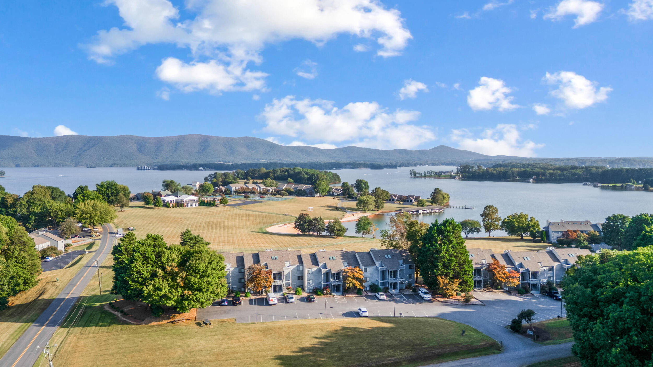 150 Sailor's Cove Drive, Unit 1218 Moneta, VA 24121 - Photo 56 of 56 a view of a lake with houses