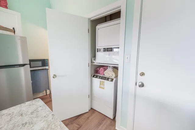 a view of a kitchen from the hallway