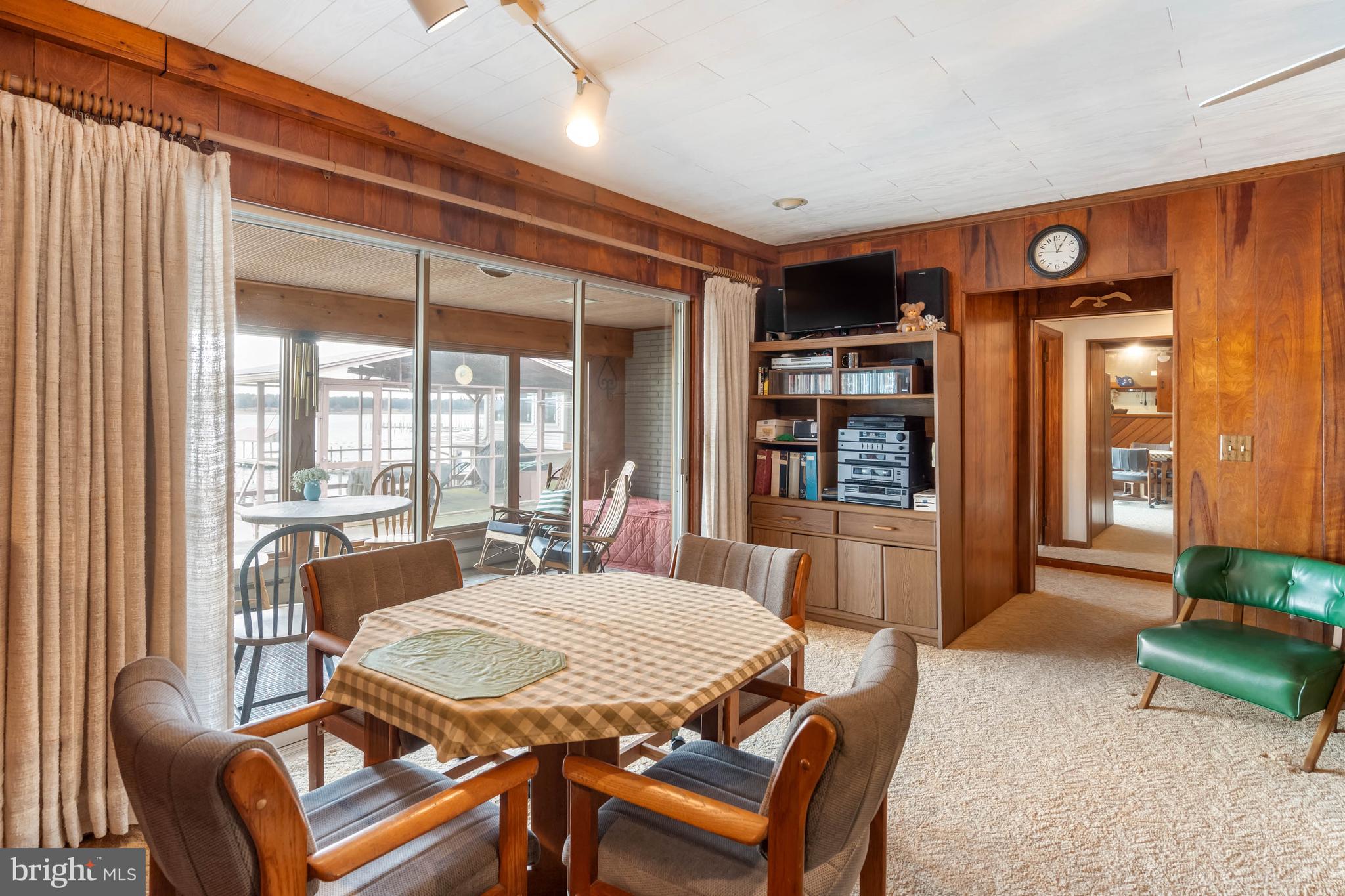 31266 River Road Millsboro, DE 19966 - Photo 14 of 47 a view of a dining room with furniture window and outside view