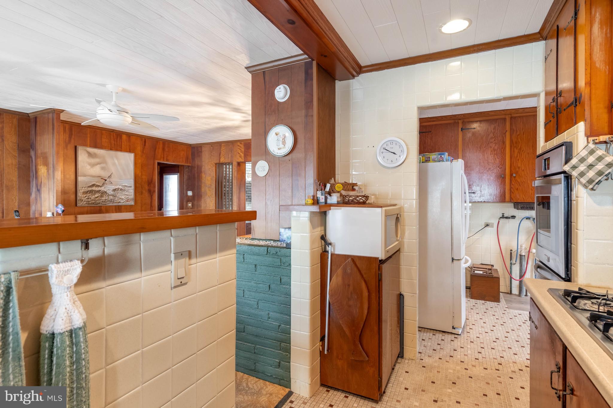 31266 River Road Millsboro, DE 19966 - Photo 21 of 47 a bathroom with a sink a mirror and a shower