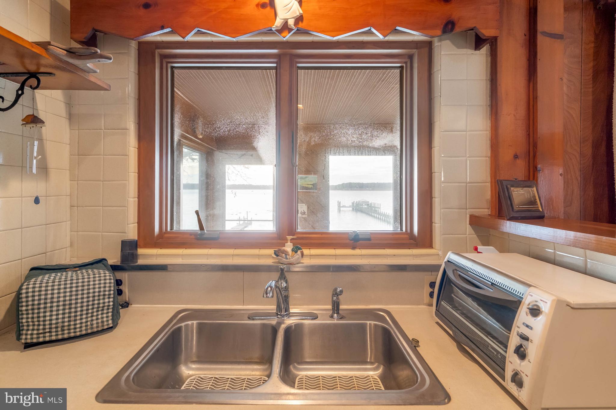 31266 River Road Millsboro, DE 19966 - Photo 22 of 47 a view of a sink and a window