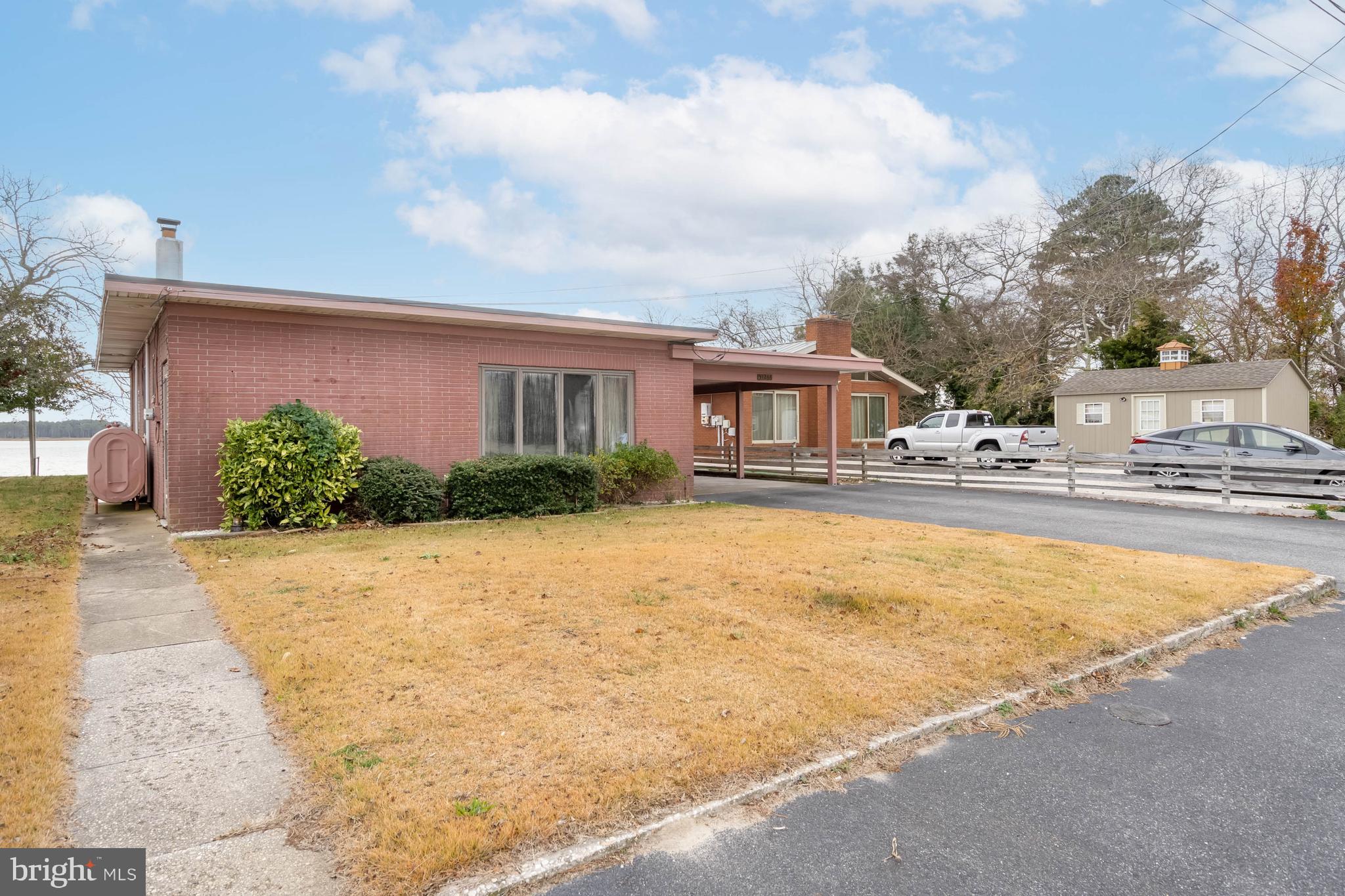 31266 River Road Millsboro, DE 19966 - Photo 34 of 47 a house with river in front of it