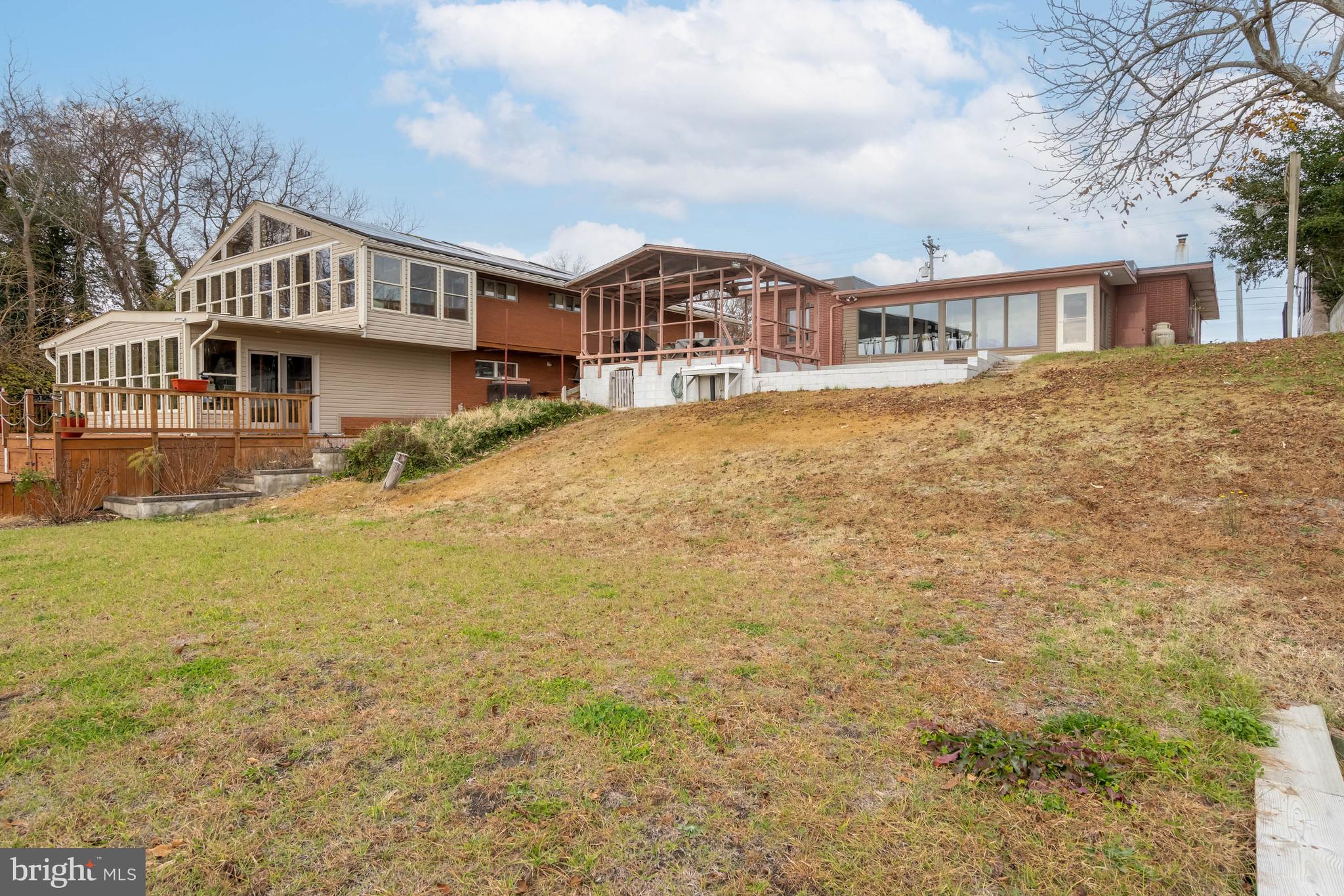 31266 River Road Millsboro, DE 19966 - Photo 41 of 47 a front view of a house with a garden