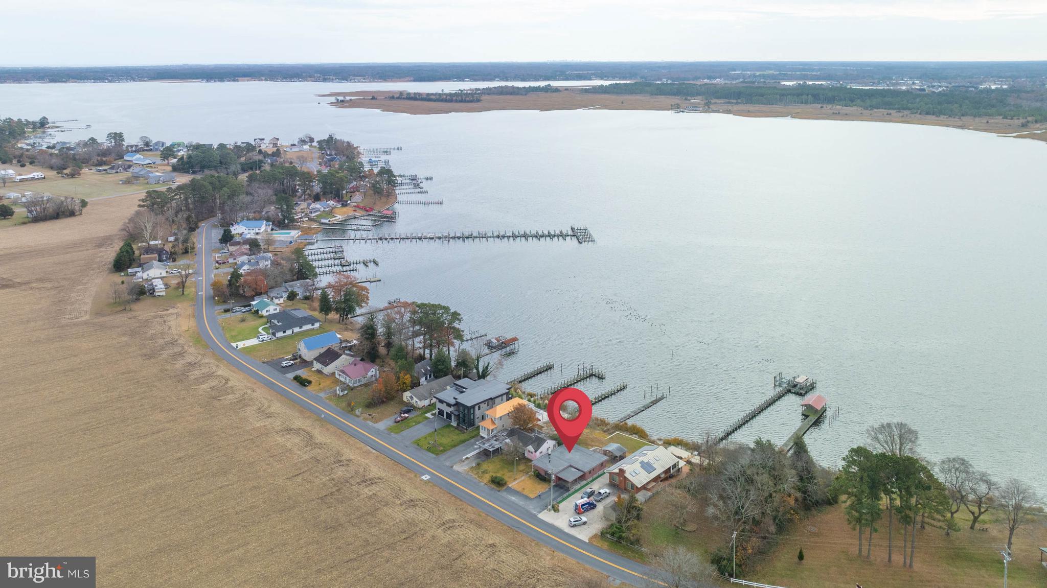 31266 River Road Millsboro, DE 19966 - Photo 44 of 47 a bathroom with a sink and a mirror