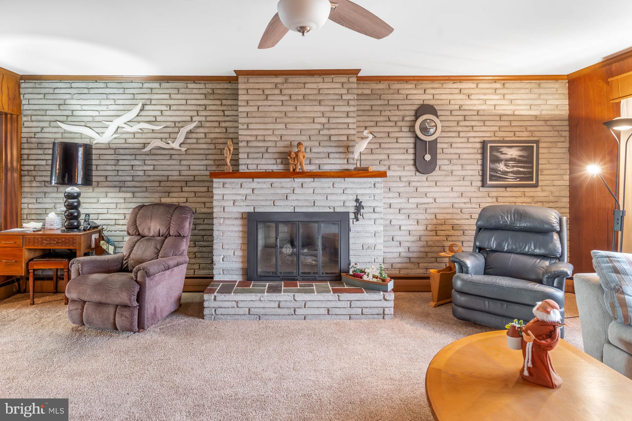 31266 River Road Millsboro, DE 19966 - Photo 9 of 47 a living room with furniture and a fireplace