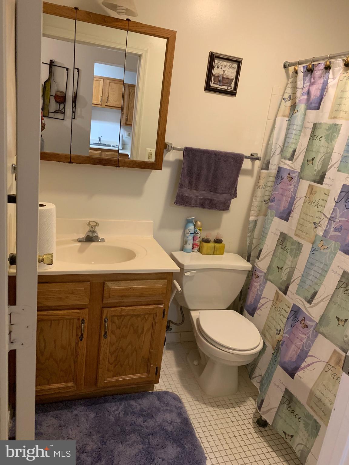 2641 Bowen Road Southeast, Unit B Washington, DC 20020 - Photo 13 of 25 1st level bath w/linen/storage closet