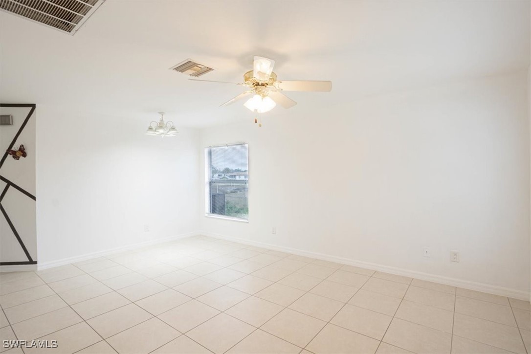 3980 Sunset Road Lehigh Acres, FL 33971 - Photo 5 of 23 en empty room with windows