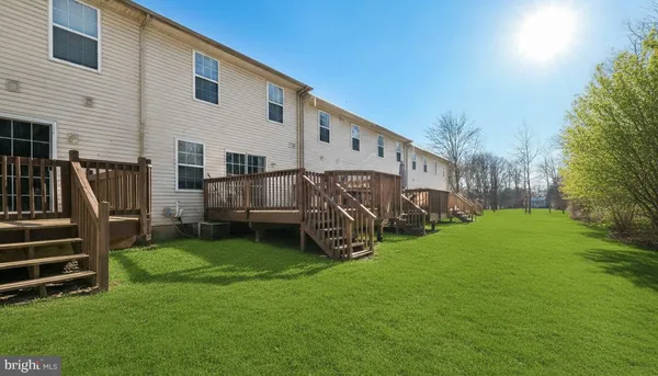 a view of a house with backyard