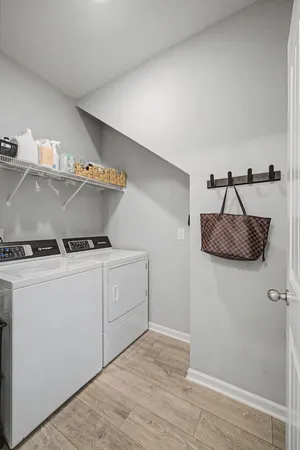 a utility room with washer and dryer