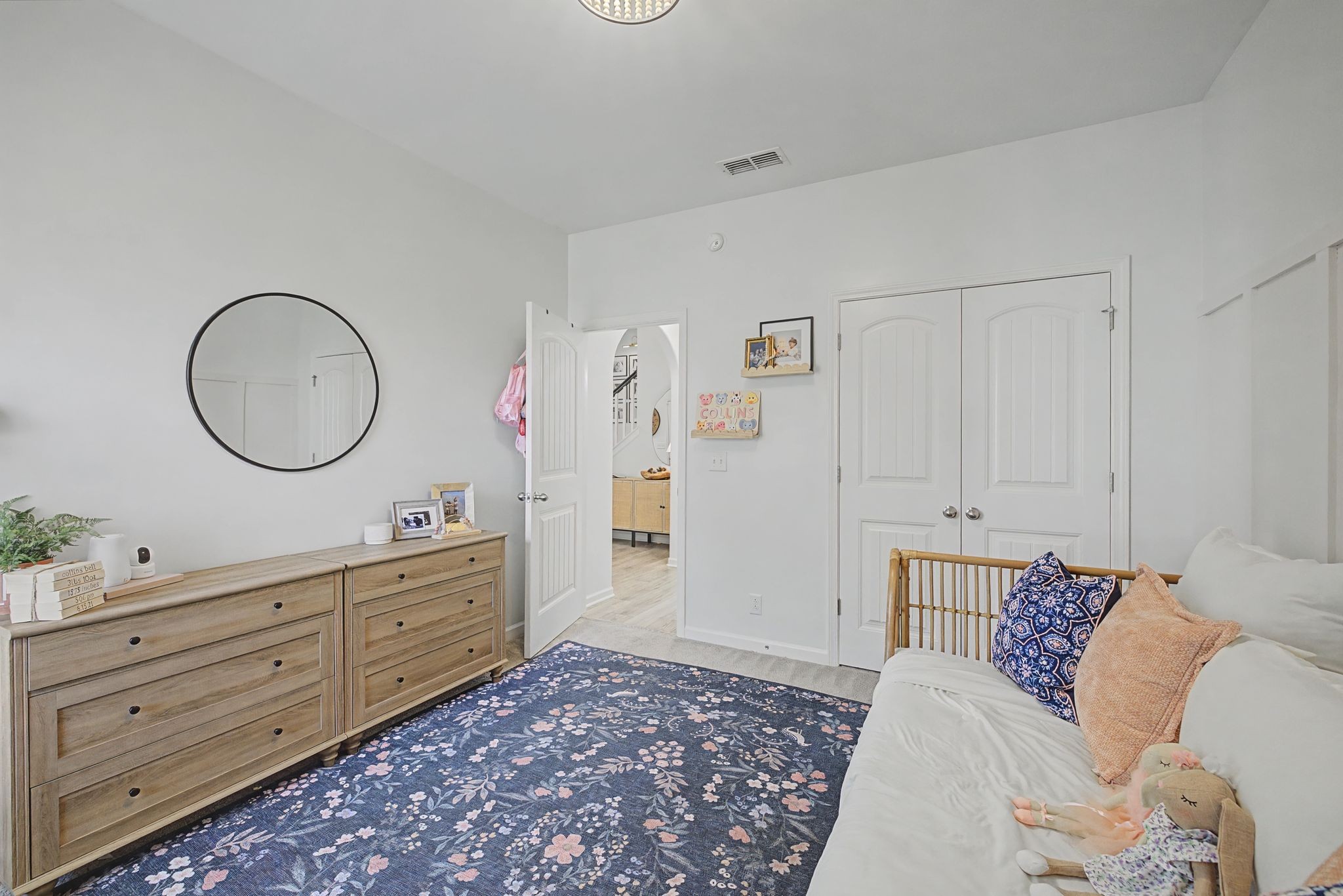 5310 Pointer Place Murfreesboro, TN 37129 - Photo 22 of 40 a bedroom with a bed a mirror and lamp on dresser