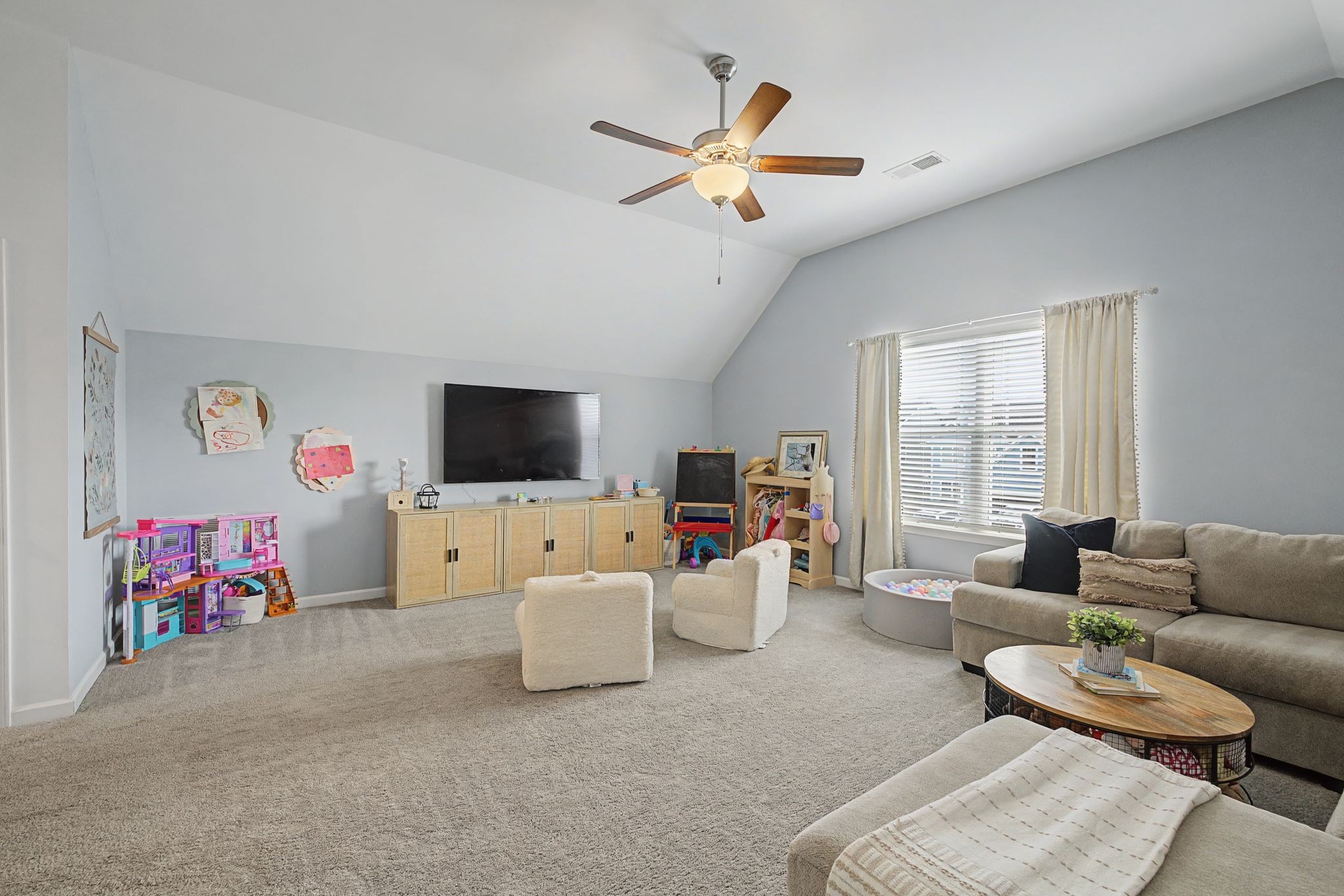 5310 Pointer Place Murfreesboro, TN 37129 - Photo 24 of 40 a living room with furniture and a flat screen tv