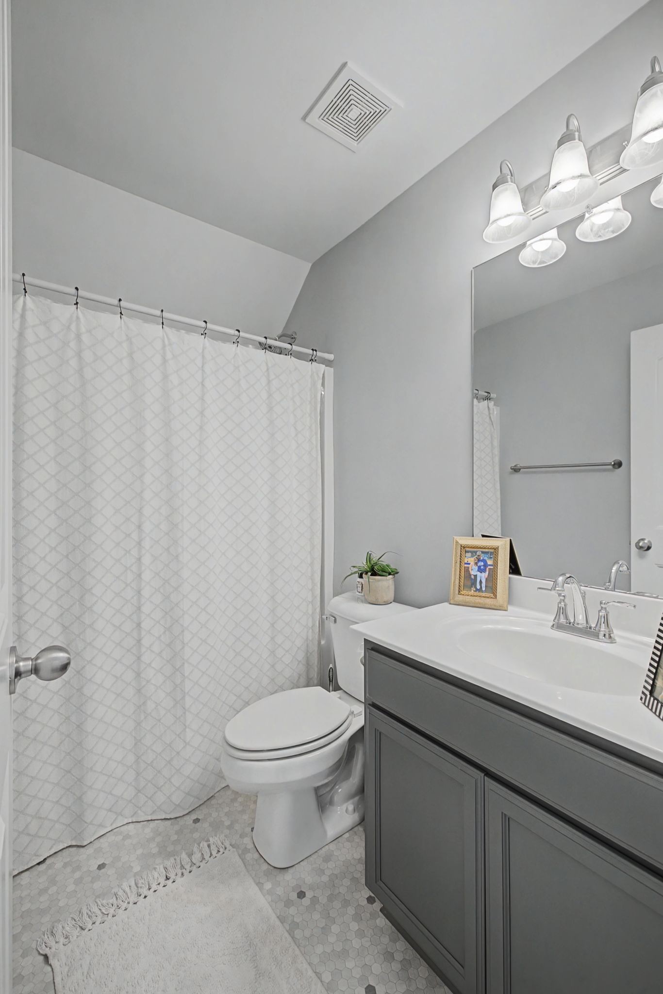 5310 Pointer Place Murfreesboro, TN 37129 - Photo 25 of 40 a bathroom with a toilet a sink and mirror