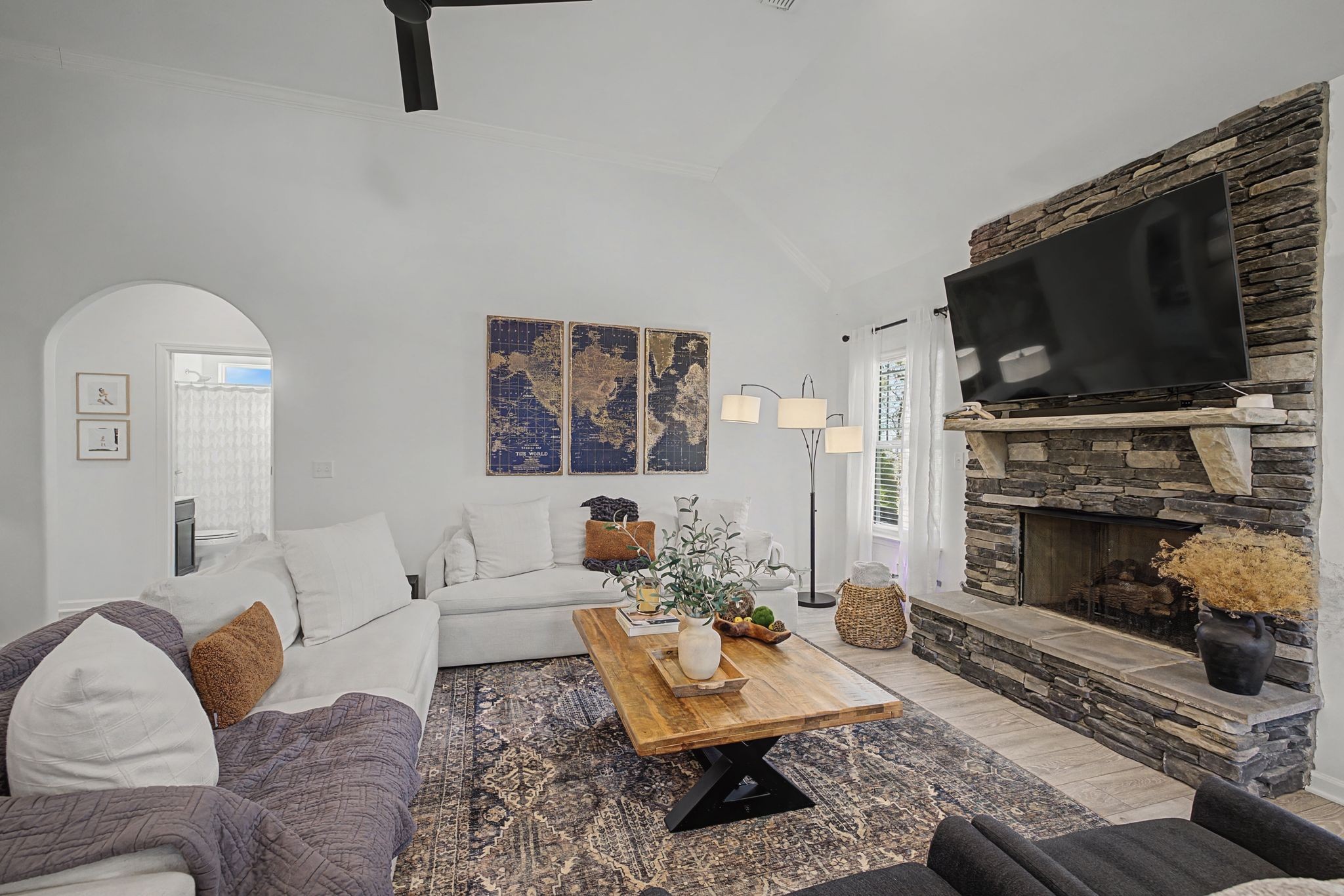 5310 Pointer Place Murfreesboro, TN 37129 - Photo 6 of 40 a living room with furniture a flat screen tv and a fireplace