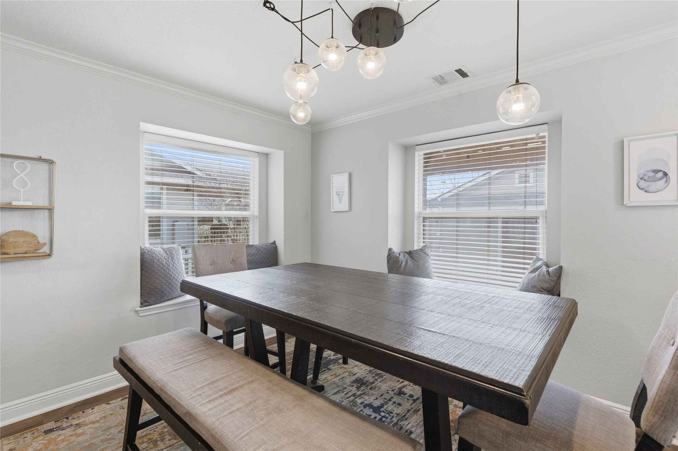258 Hogan Kyle, TX 78640 - Photo 16 of 40 a view of a dining room with furniture window and wooden floor