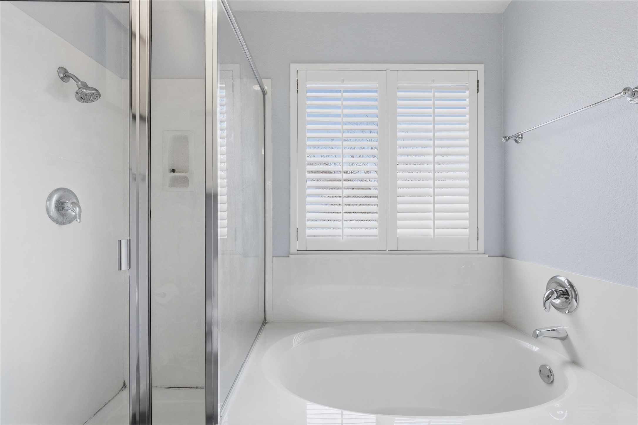 258 Hogan Kyle, TX 78640 - Photo 27 of 40 a white bath tub sitting next to a window