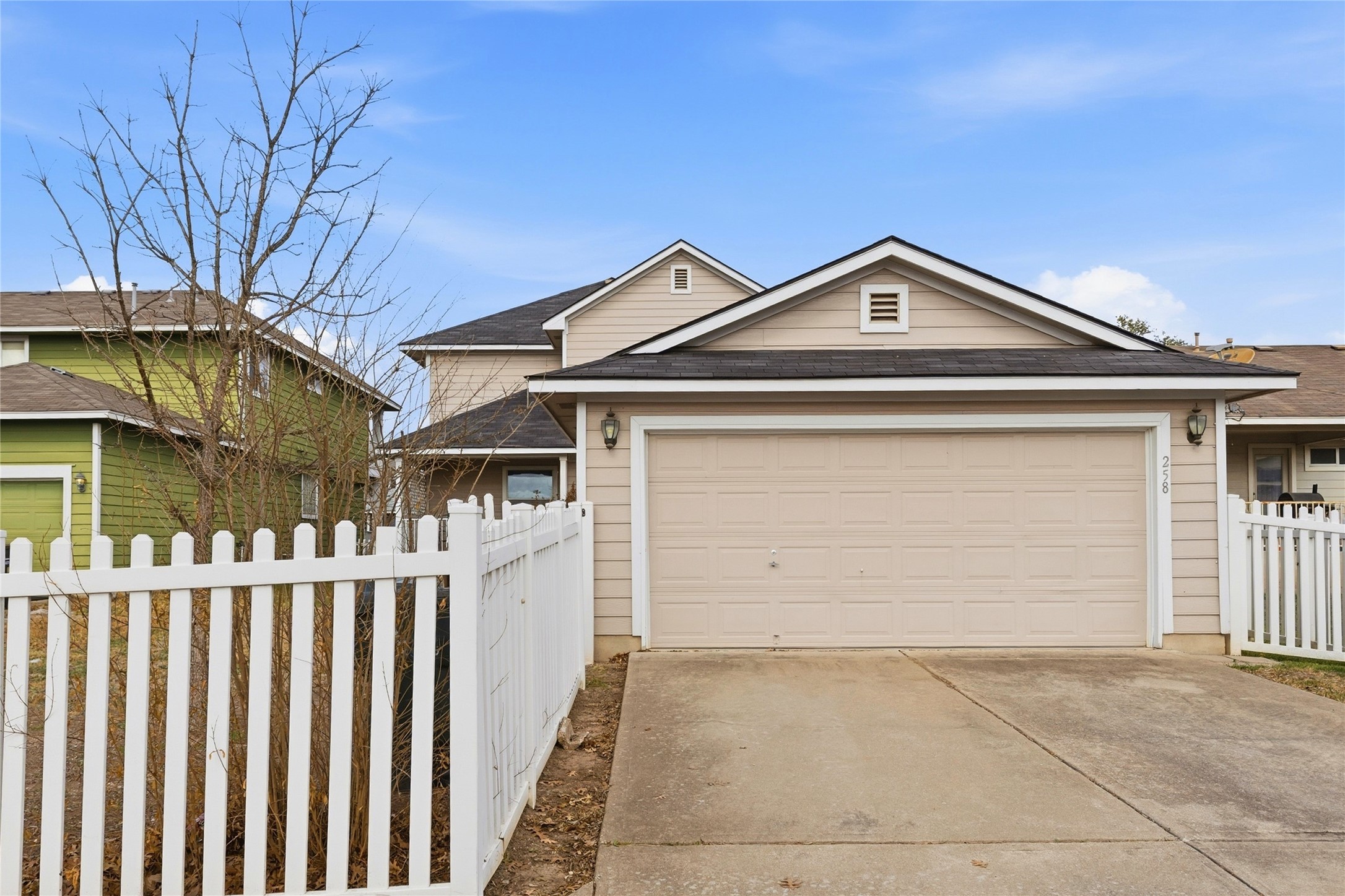 258 Hogan Kyle, TX 78640 - Photo 34 of 40 front view of a house with a garage