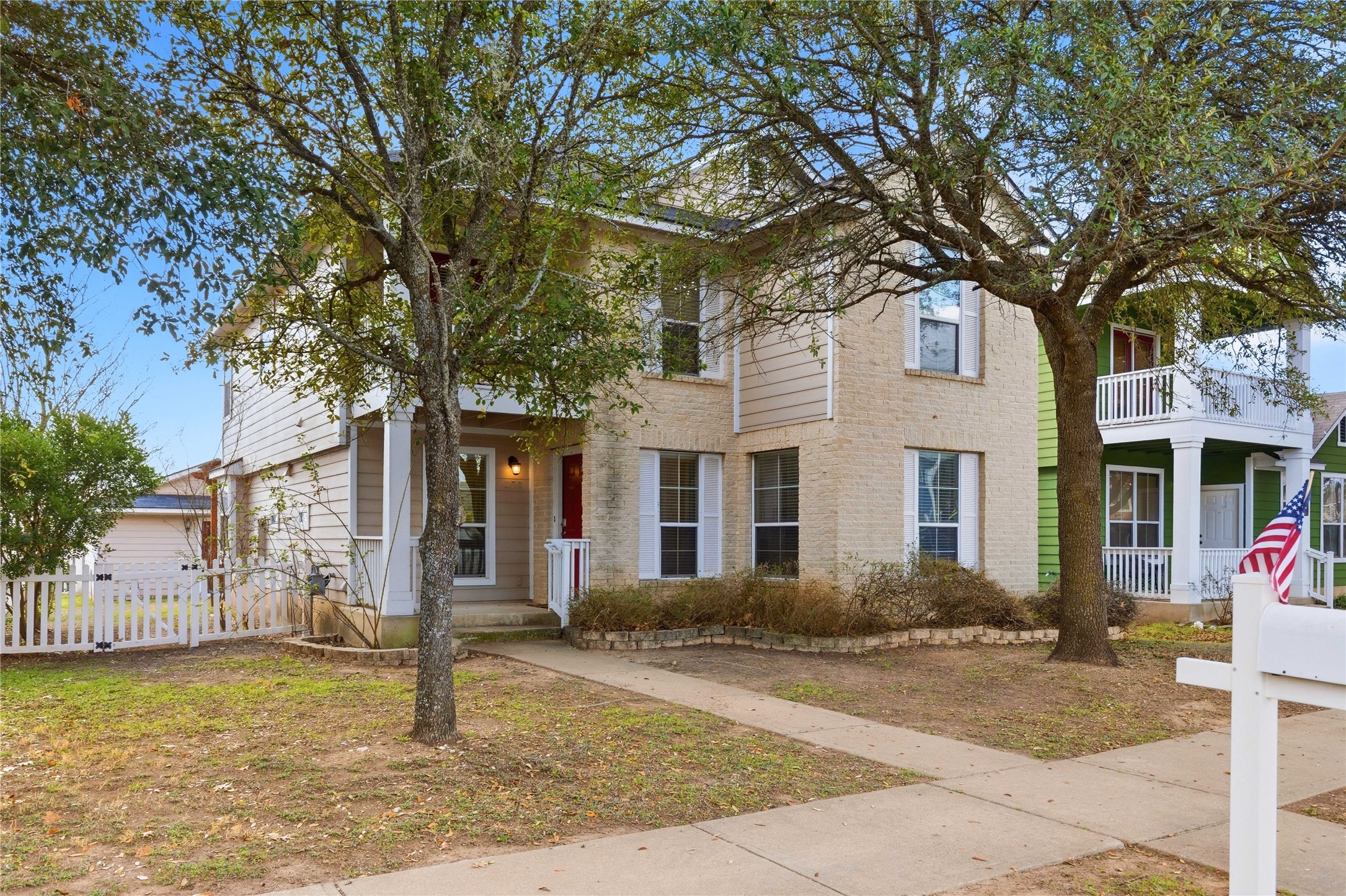 258 Hogan Kyle, TX 78640 - Photo 36 of 40 a front view of a house with a tree