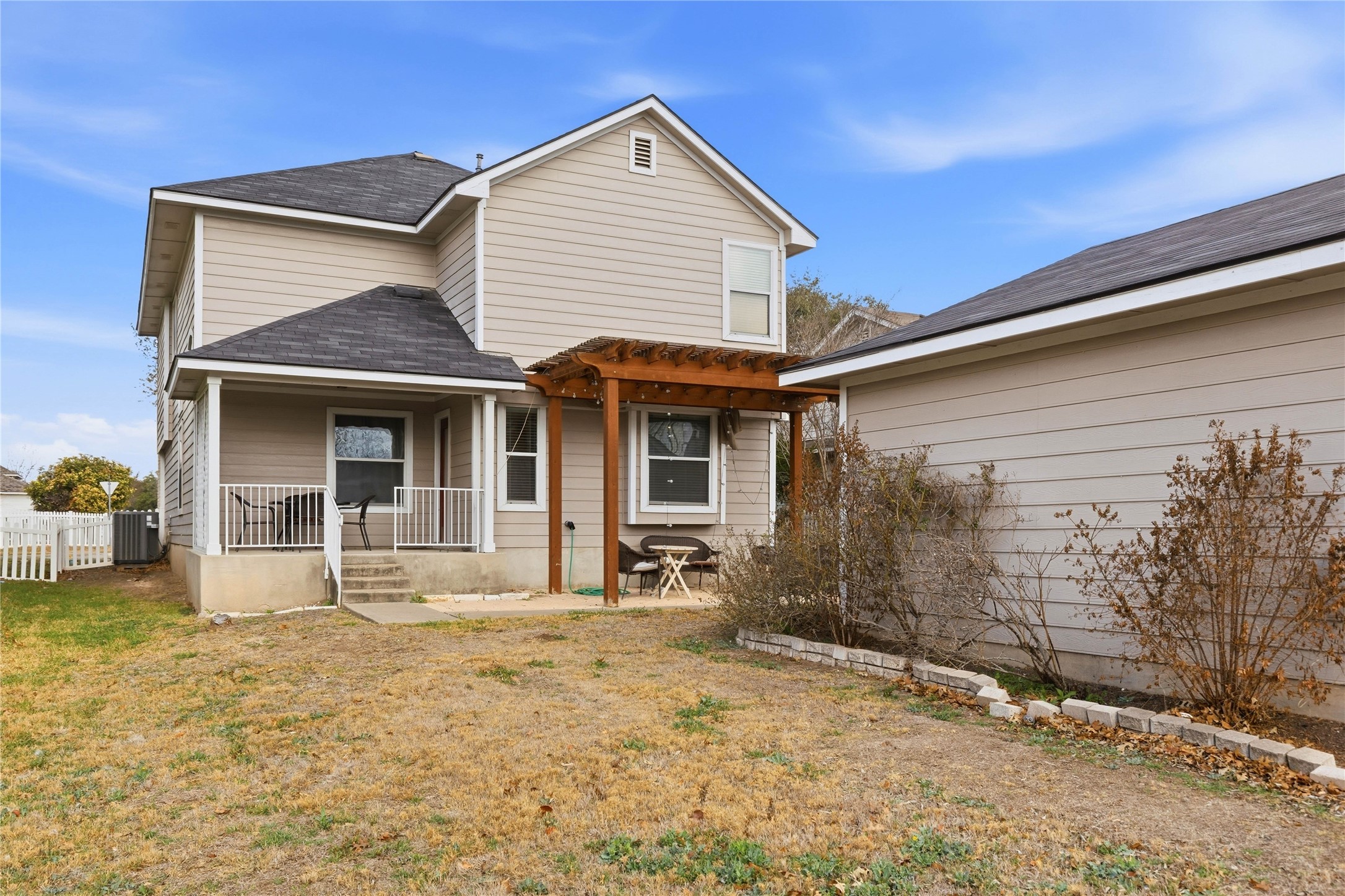 258 Hogan Kyle, TX 78640 - Photo 39 of 40 a front view of a house with garden