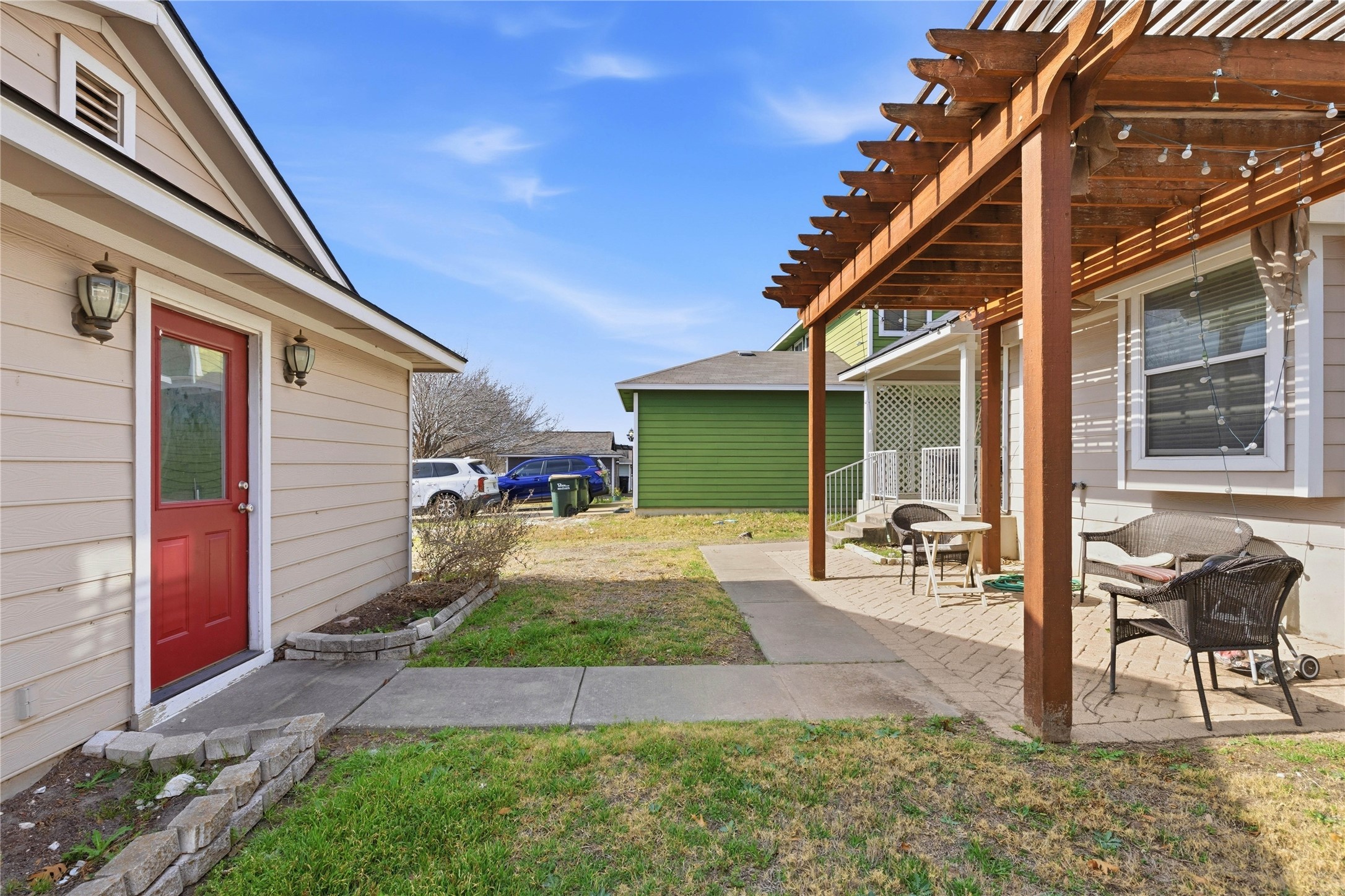 258 Hogan Kyle, TX 78640 - Photo 6 of 40 a view of a backyard with a patio