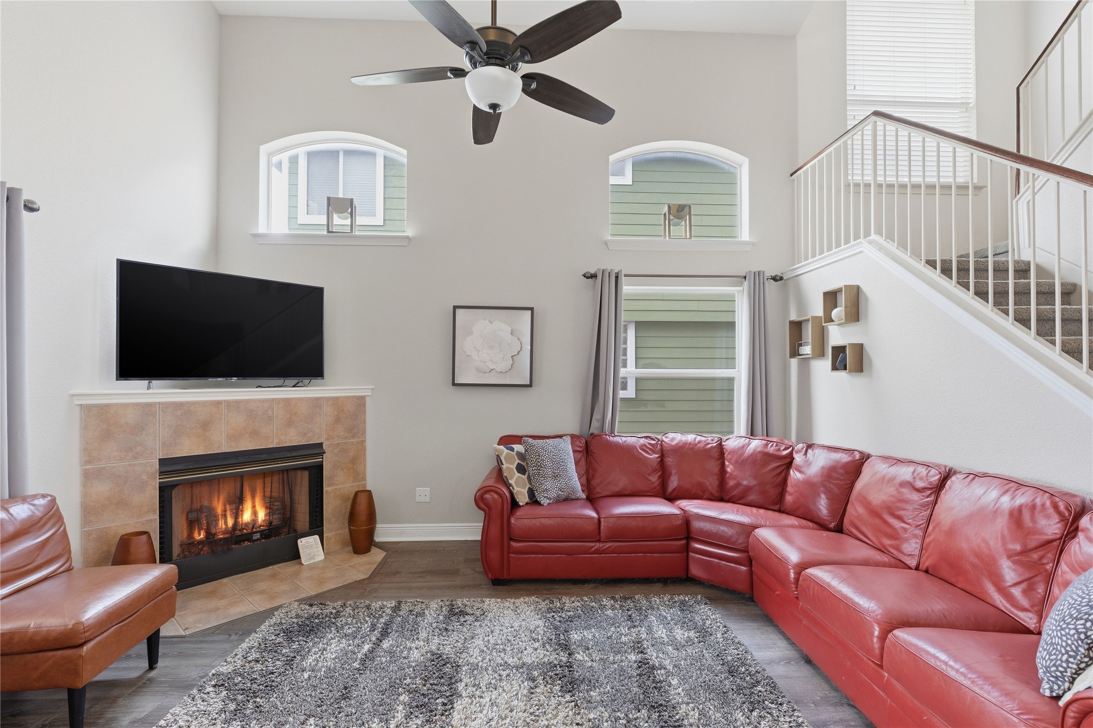 258 Hogan Kyle, TX 78640 - Photo 9 of 40 a living room with furniture fireplace and flat screen tv