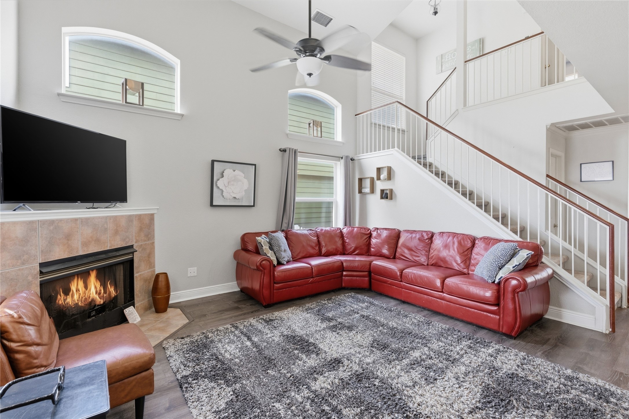 258 Hogan Kyle, TX 78640 - Photo 10 of 40 a living room with furniture fireplace and flat screen tv
