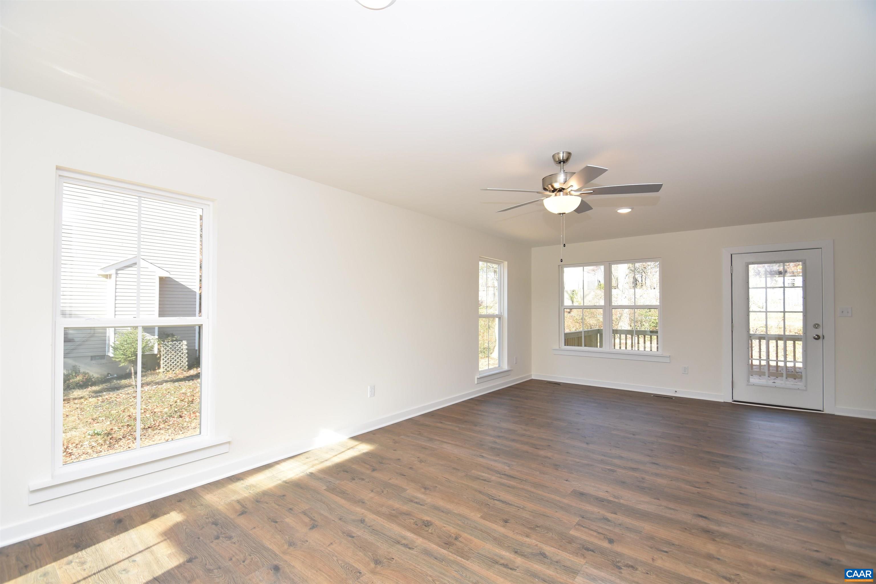 Lot4 Kidds Dairy Road, Unit KD4 Scottsville, VA 24590 - Photo 11 of 26 a view of an empty room with a window and wooden floor