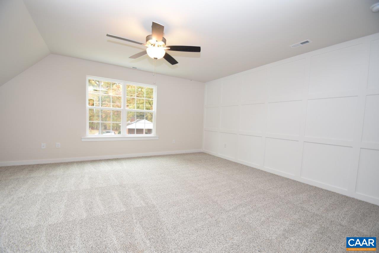 Lot4 Kidds Dairy Road, Unit KD4 Scottsville, VA 24590 - Photo 17 of 26 an empty room with a window and a ceiling fan