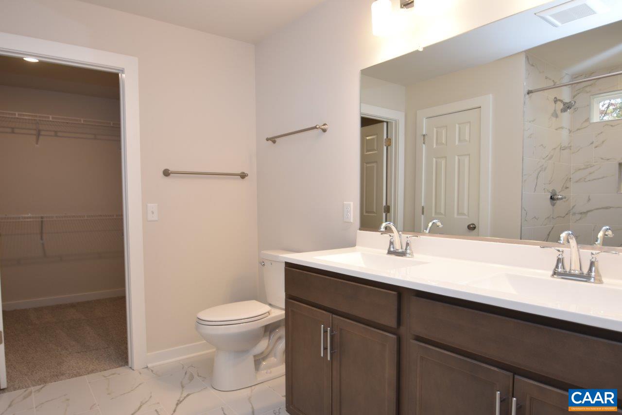 Lot4 Kidds Dairy Road, Unit KD4 Scottsville, VA 24590 - Photo 19 of 26 a bathroom with a sink a toilet and a mirror