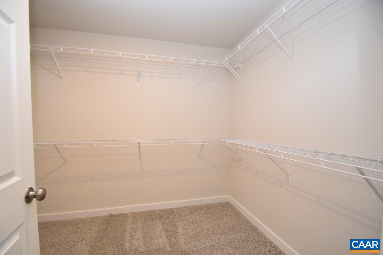 Lot4 Kidds Dairy Road, Unit KD4 Scottsville, VA 24590 - Photo 20 of 26 a view of a room with racks on the wall