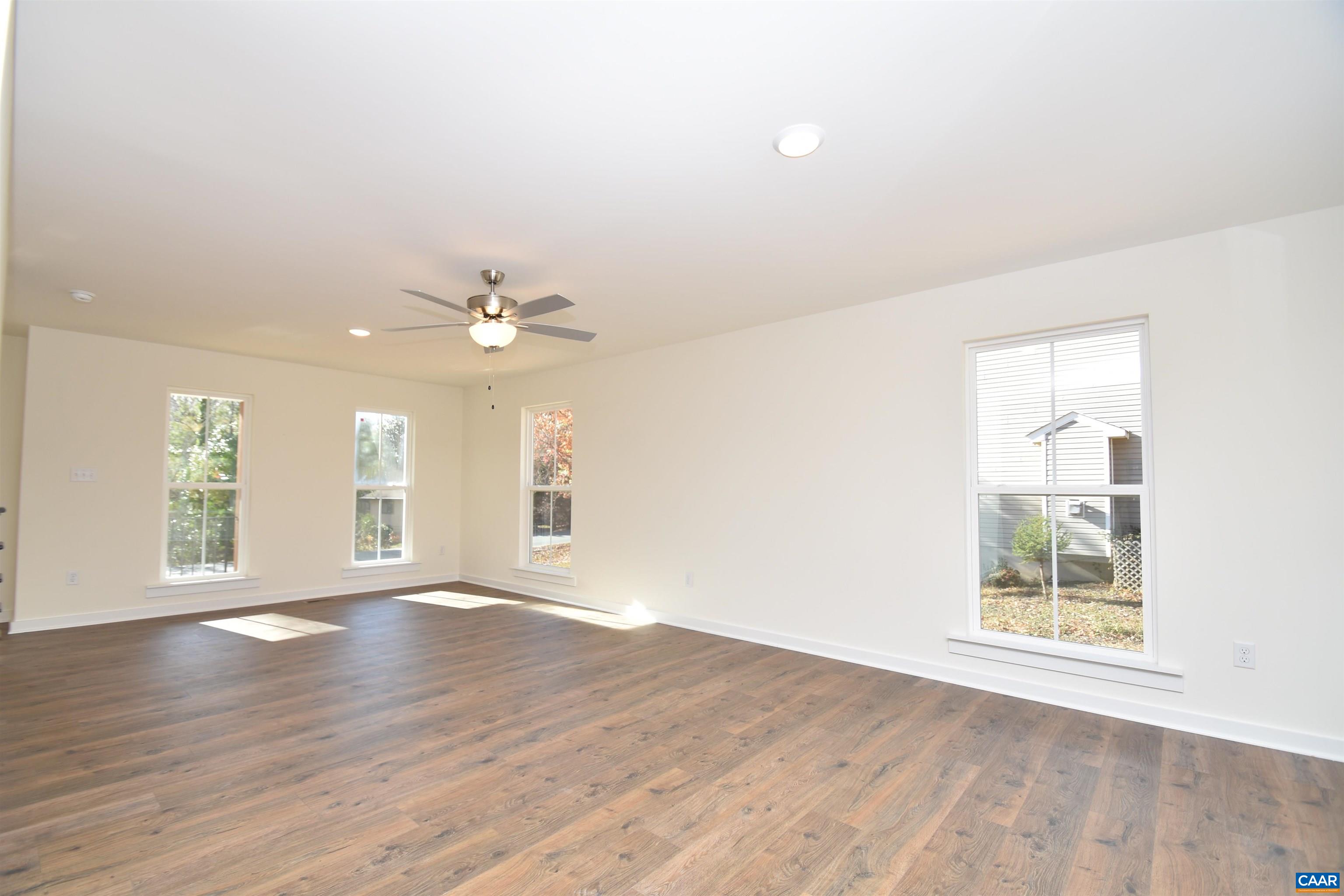 Lot4 Kidds Dairy Road, Unit KD4 Scottsville, VA 24590 - Photo 10 of 26 wooden floor in an empty room with a window