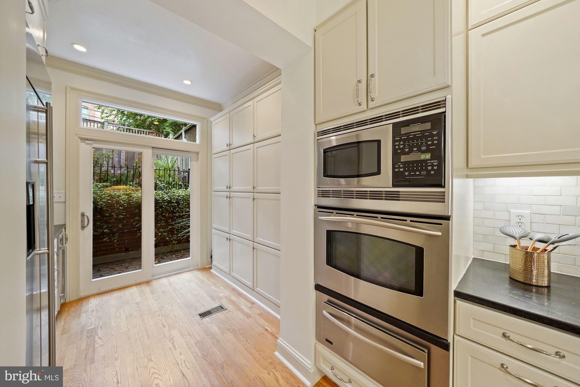 2834 27th Street Northwest Washington, DC 20008 - Photo 12 of 49 Sliding Glass Doors and Transom