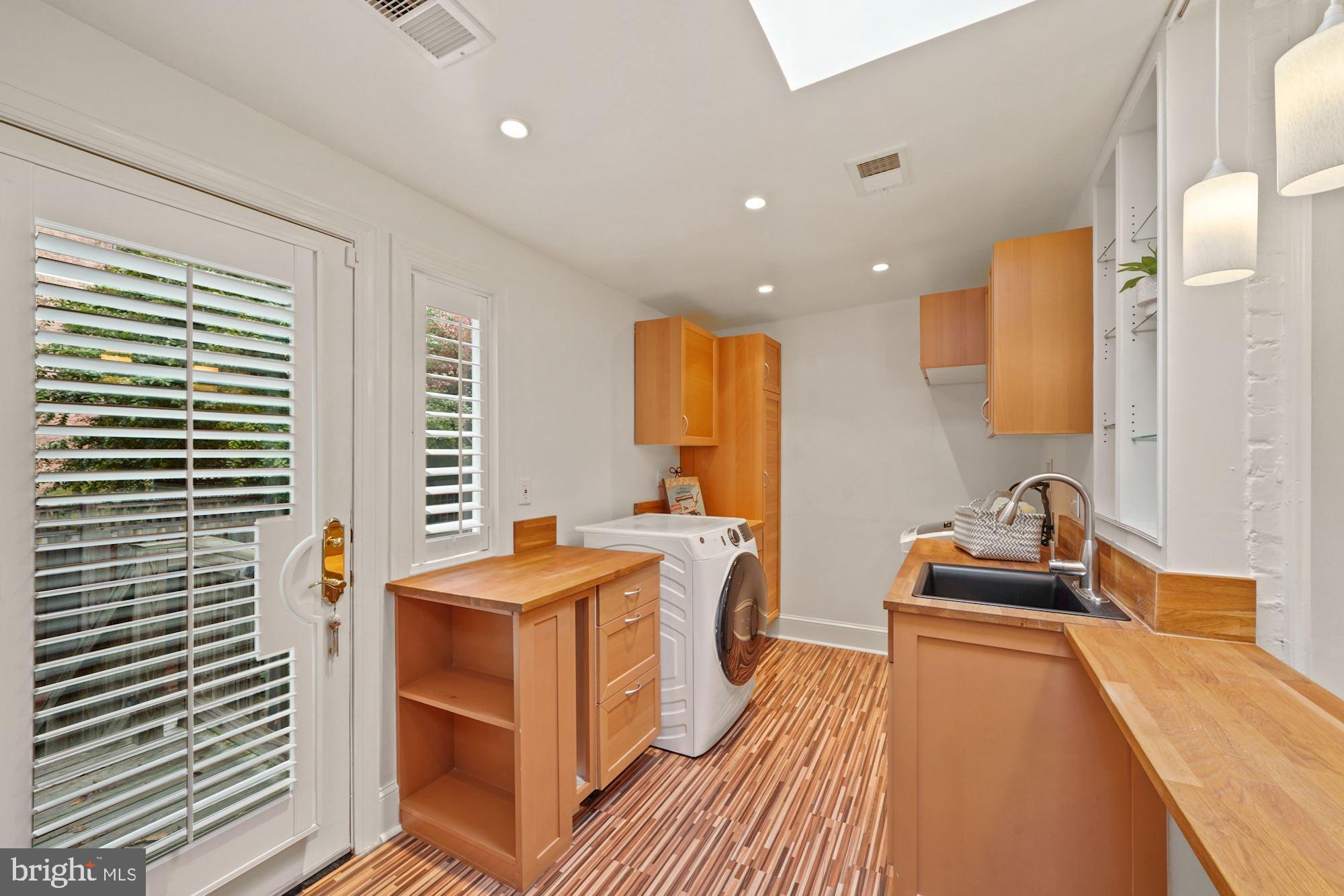 2834 27th Street Northwest Washington, DC 20008 - Photo 28 of 49 Balcony, Cabinets and Laundry