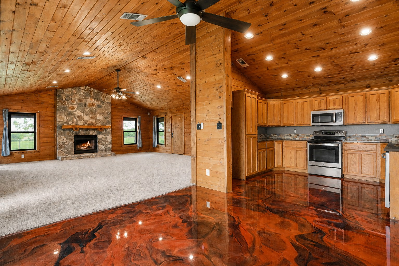 800 County Road 126 Georgetown, TX 78626 - Photo 16 of 33 a open kitchen with kitchen island wooden cabinets and stainless steel appliances