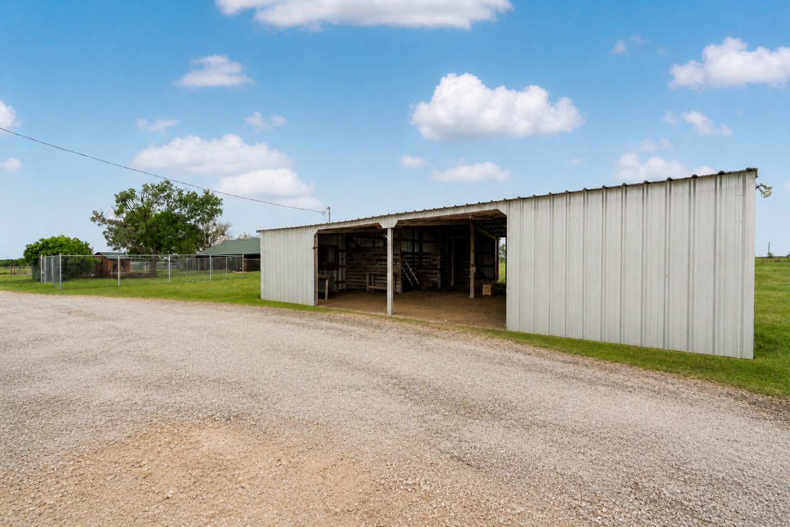 800 County Road 126 Georgetown, TX 78626 - Photo 28 of 33 a view of a house with a yard and garage