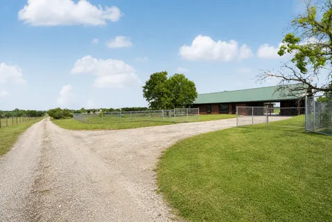 a view of a lake with a big yard