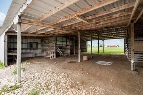 a view of a room with wooden walls