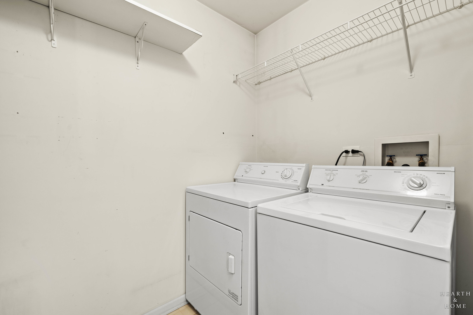 330 Buckingham Circle, Unit C Elgin, IL 60120 - Photo 18 of 21 a utility room with dryer and washer