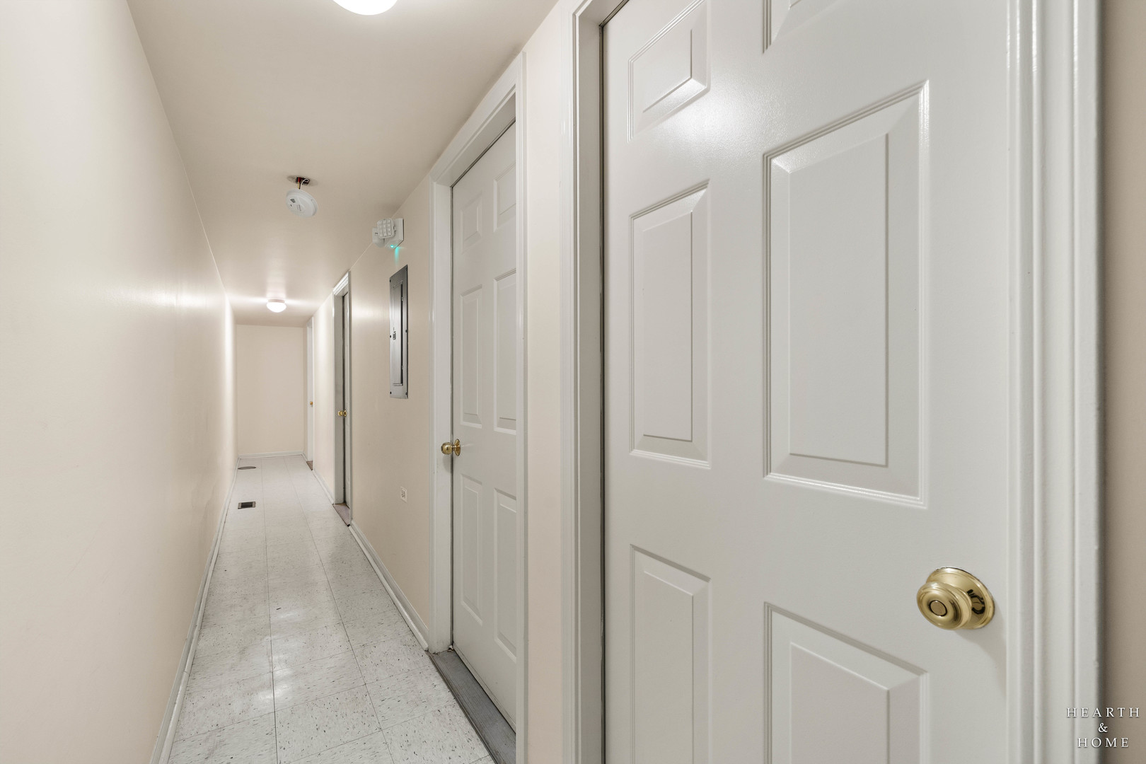 330 Buckingham Circle, Unit C Elgin, IL 60120 - Photo 19 of 21 a view of a hallway with wooden shelves