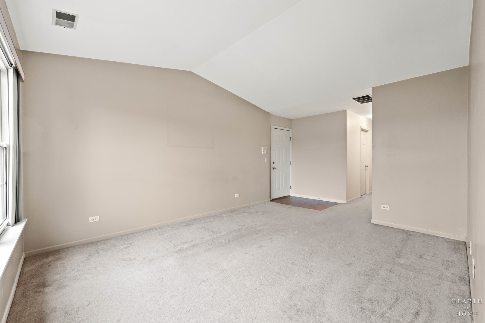 330 Buckingham Circle, Unit C Elgin, IL 60120 - Photo 5 of 21 an empty room with a natural light