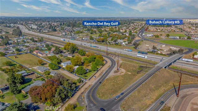 a view of swimming pool with a garden and seating area