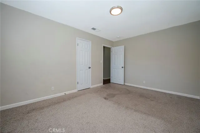 an empty room with an entryway