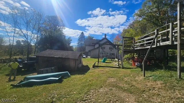 a view of a yard with an outdoor space