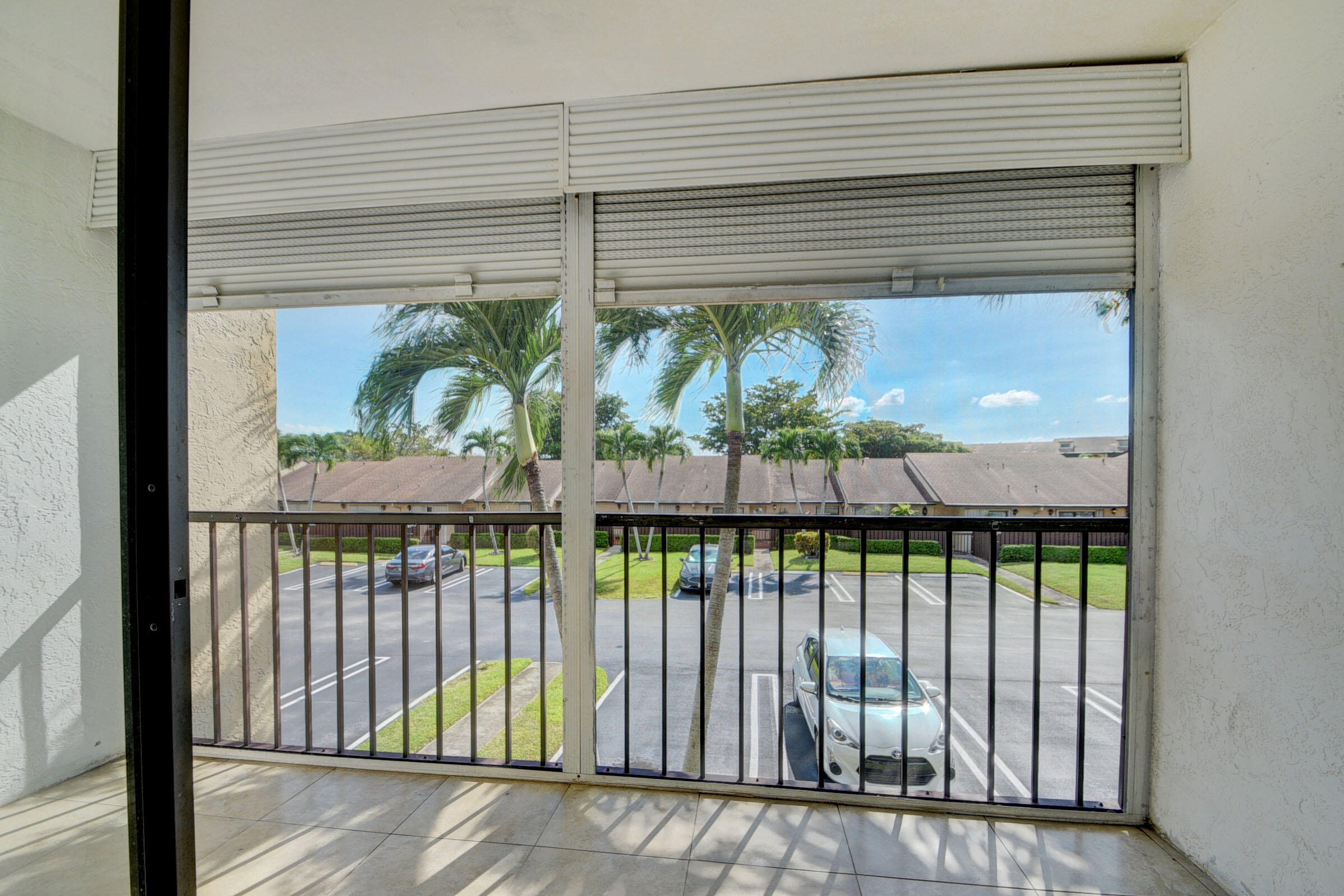 802 Sky Pine Way, Unit C2 Greenacres, FL 33415 - Photo 14 of 28 a view of a porch