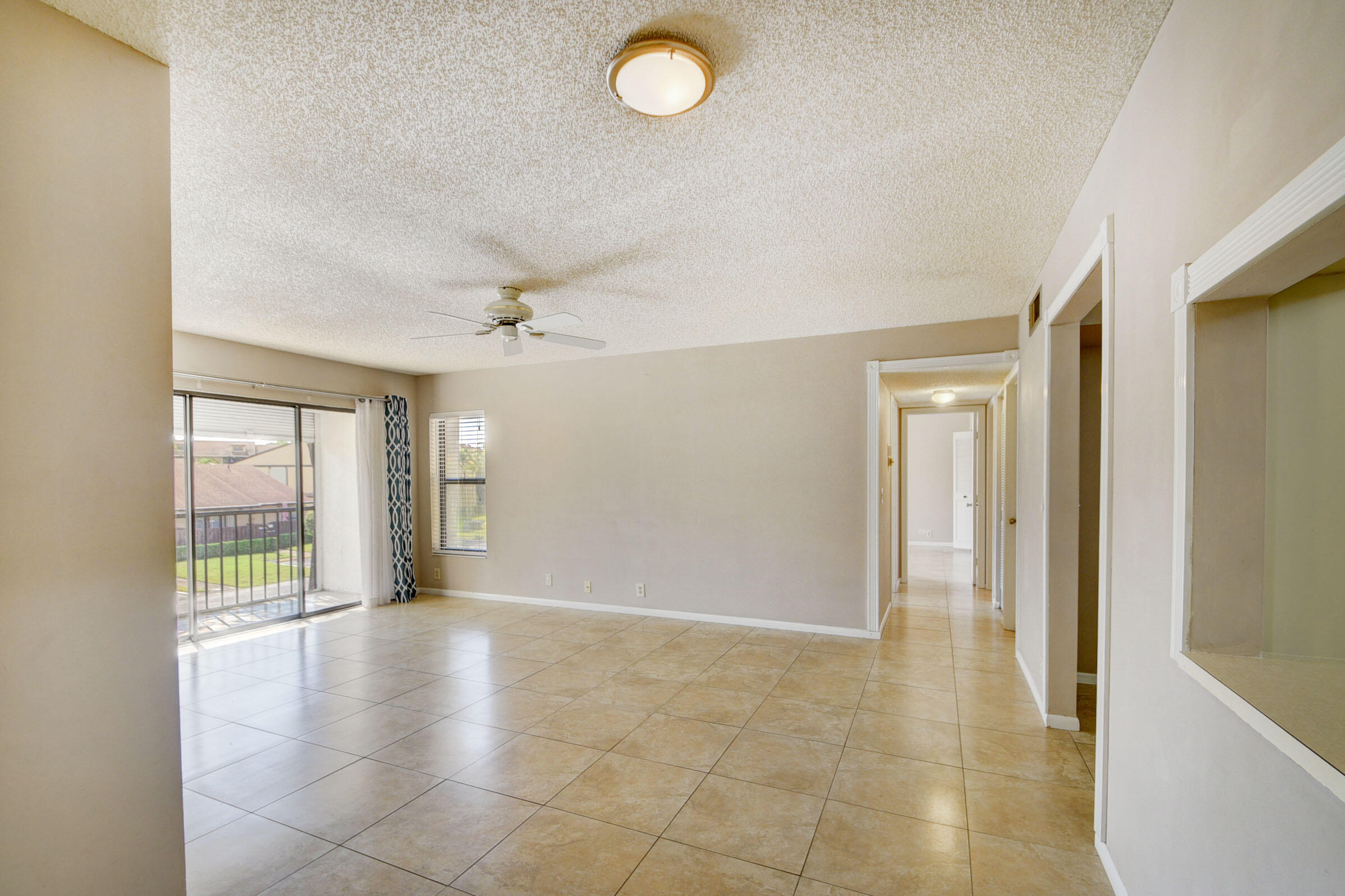 802 Sky Pine Way, Unit C2 Greenacres, FL 33415 - Photo 7 of 28 wooden floor in an empty room