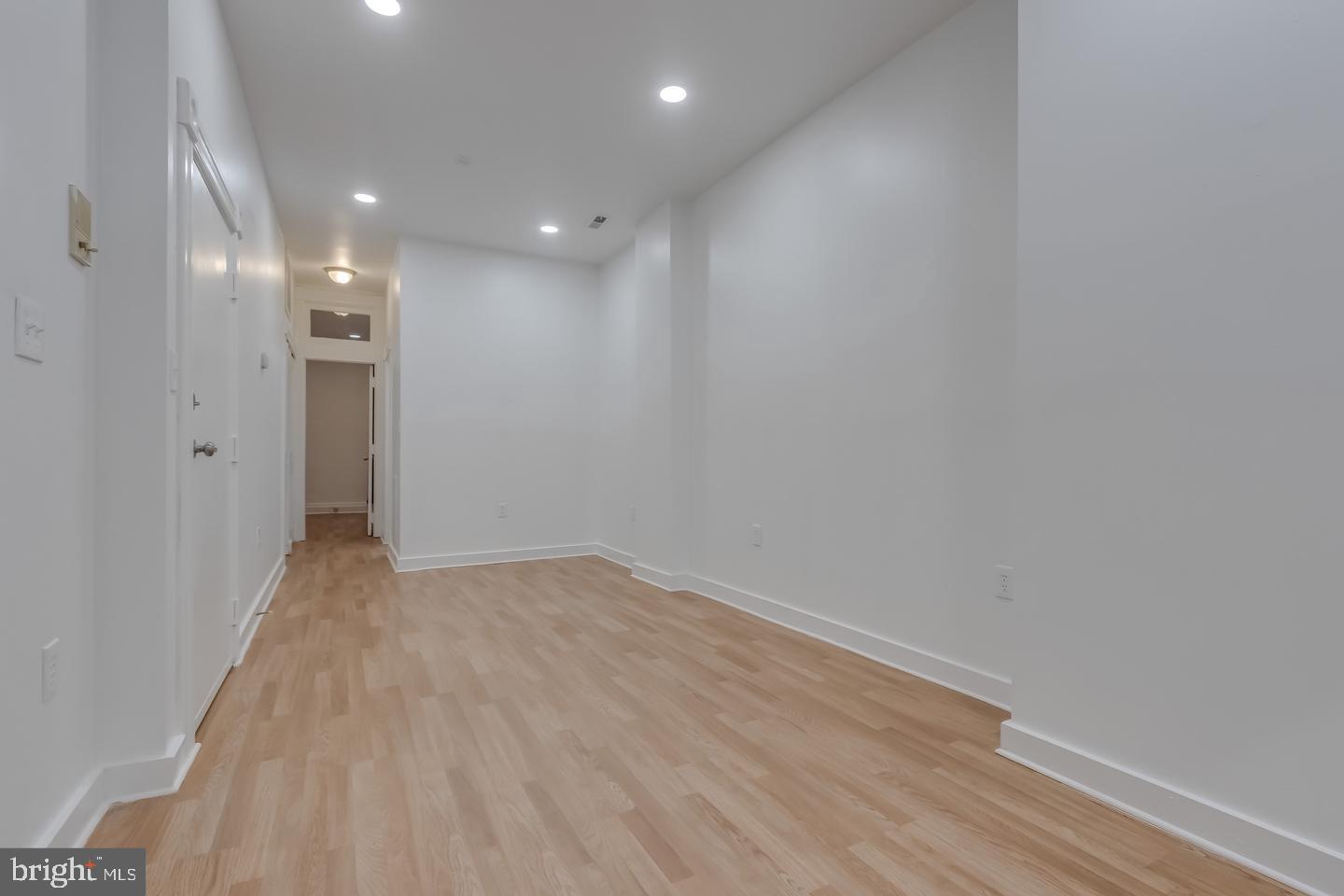 1113 North Calvert Street Baltimore, MD 21202 - Photo 4 of 25 a view of an empty room