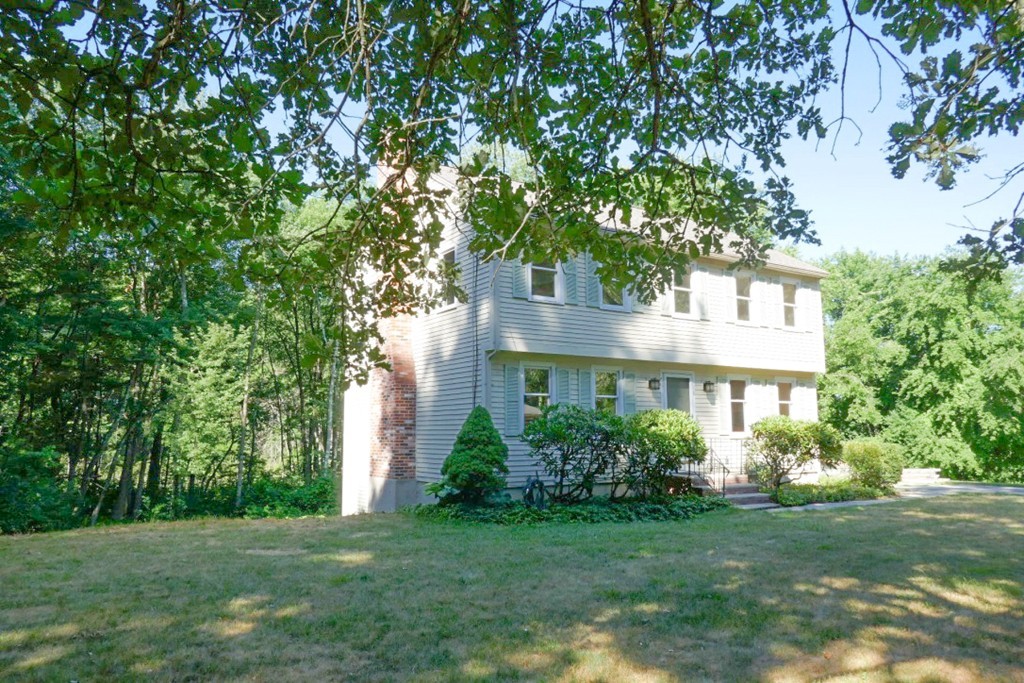 18 Line Road Westford, MA 01886 - Photo 11 of 12 a front view of a house with a yard